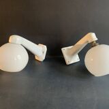 Pair of Art Deco porcelain wall lights with white Opaline globes, 1920