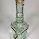 Quadrangular glass fountain and brass tap