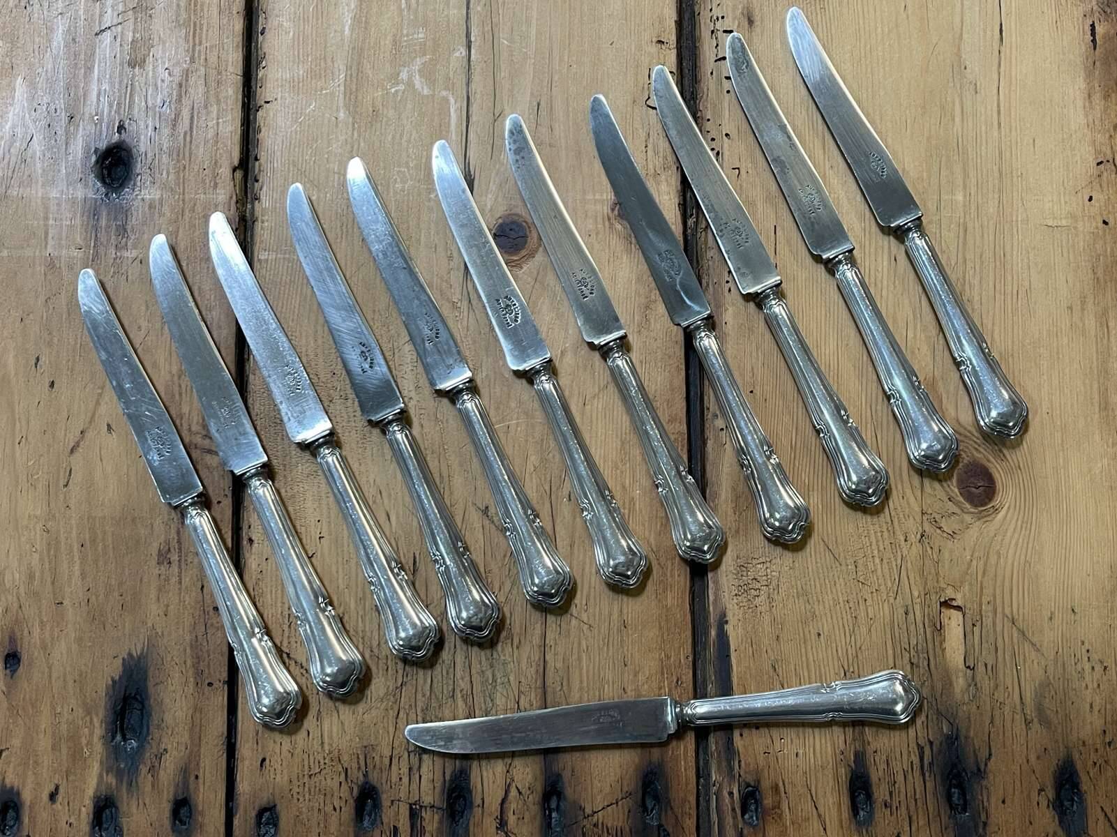 Set of 12 dessert knives in silver metal with steel blades from the early 20th century
