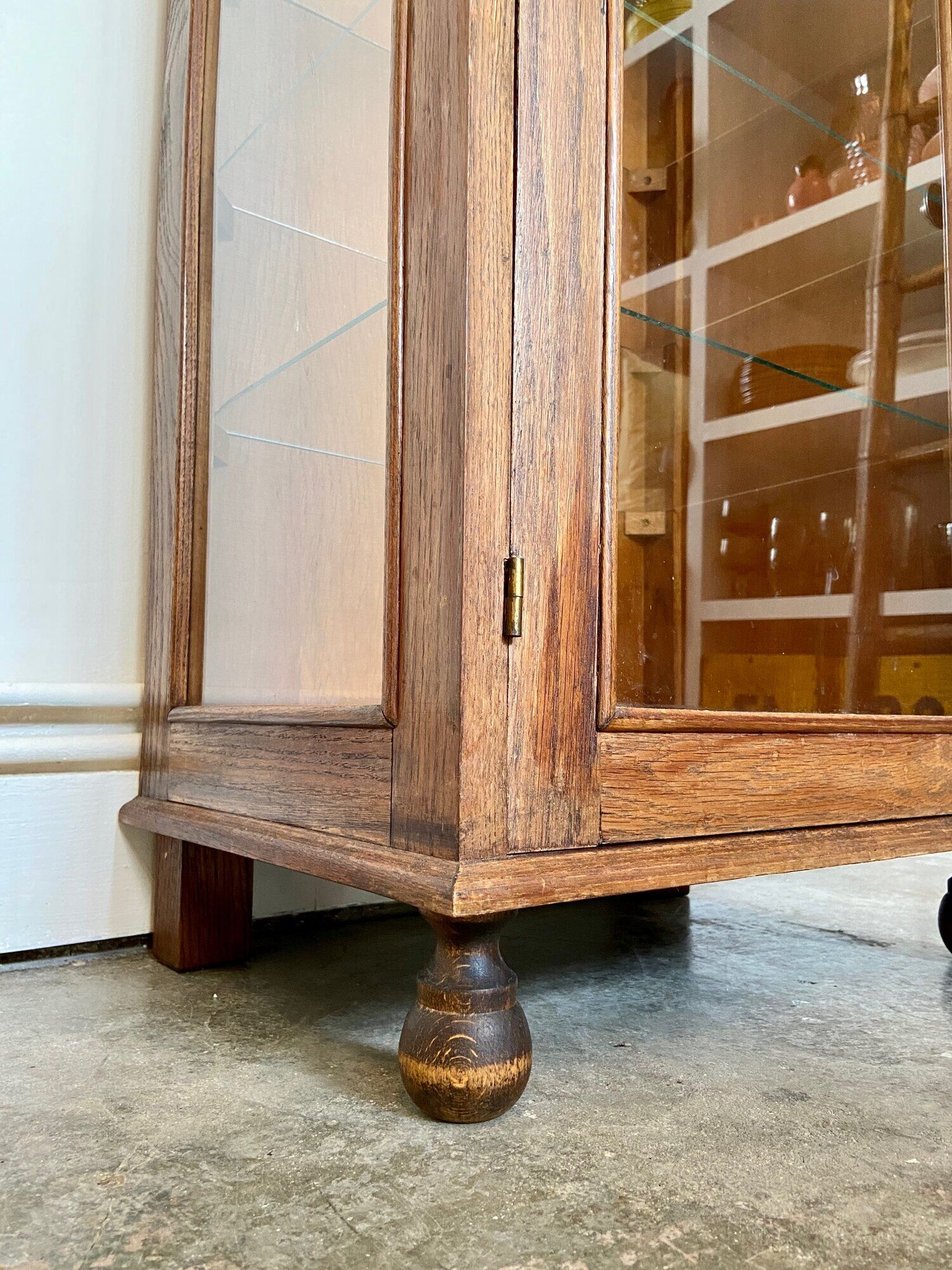 Dark wood display case and transparent glass