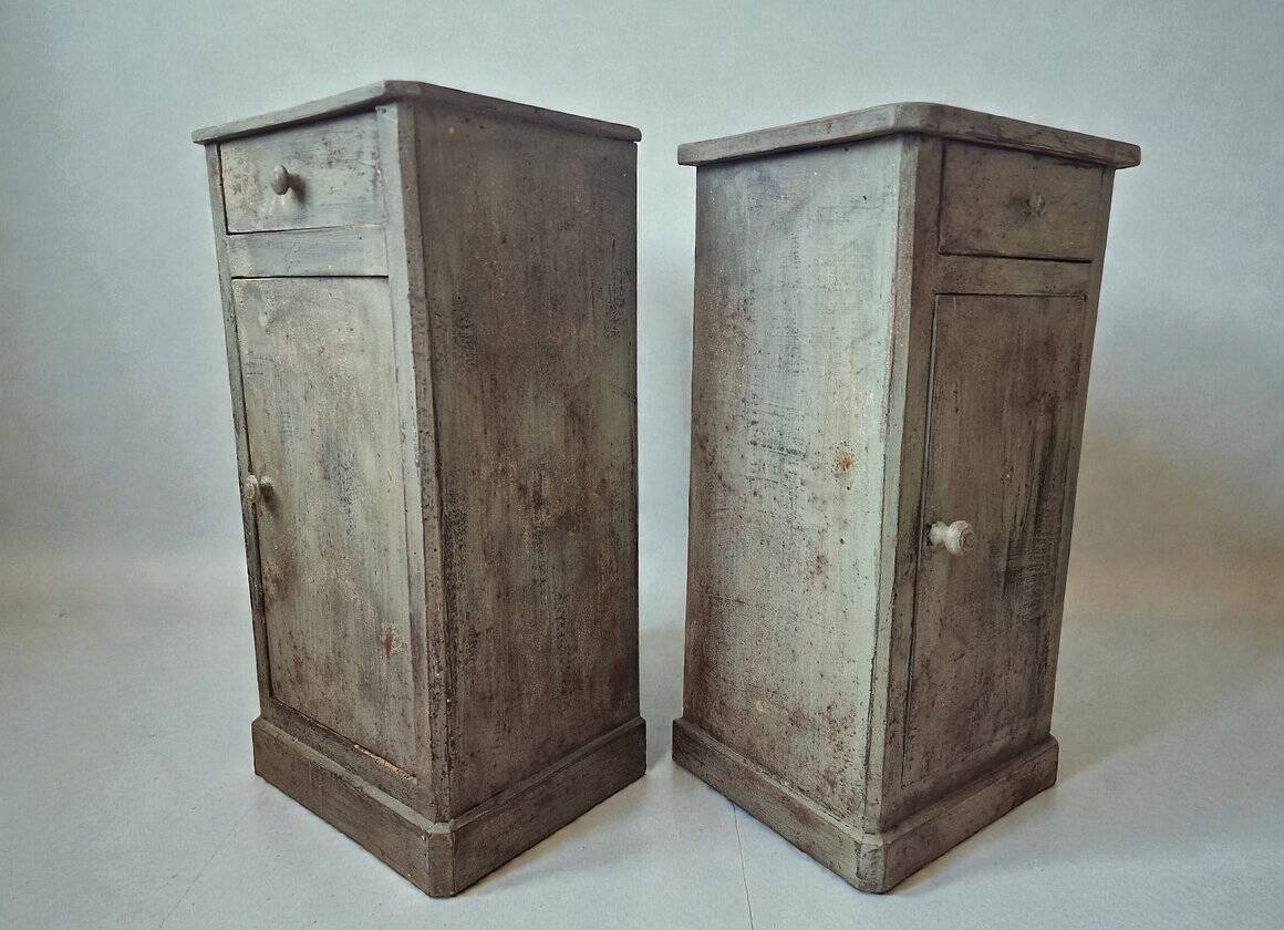 Pair of antique bedside tables with a green patina