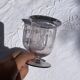 Antique Art Deco engraved glass, silvered rim and base.