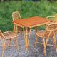 1 Table 1 fauteuil 3 chaises en bambou et rotin attribués à Audoux et Minet
