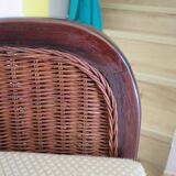 Vintage colonial-style armchair in woven rattan and exotic wood