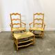 Pair of French Provencal Radassier beech chairs and ottoman, with rush seating.