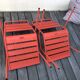 2 low chairs Fermob model Monceau in capucine colour.