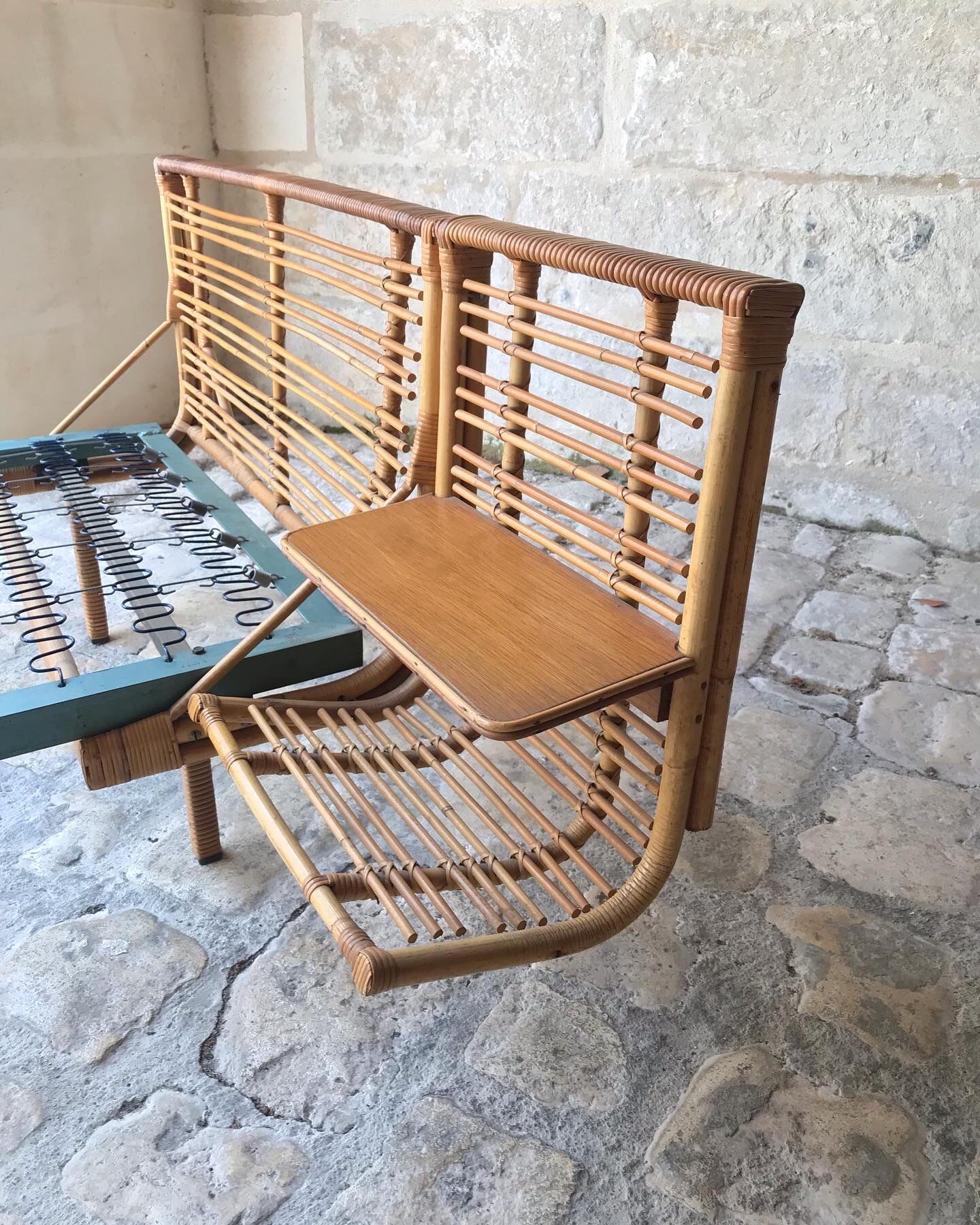 Twin rattan beds with built-in bedside tables