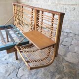 Twin rattan beds with built-in bedside tables