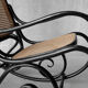 Black rocking chair in curved wood, years 50