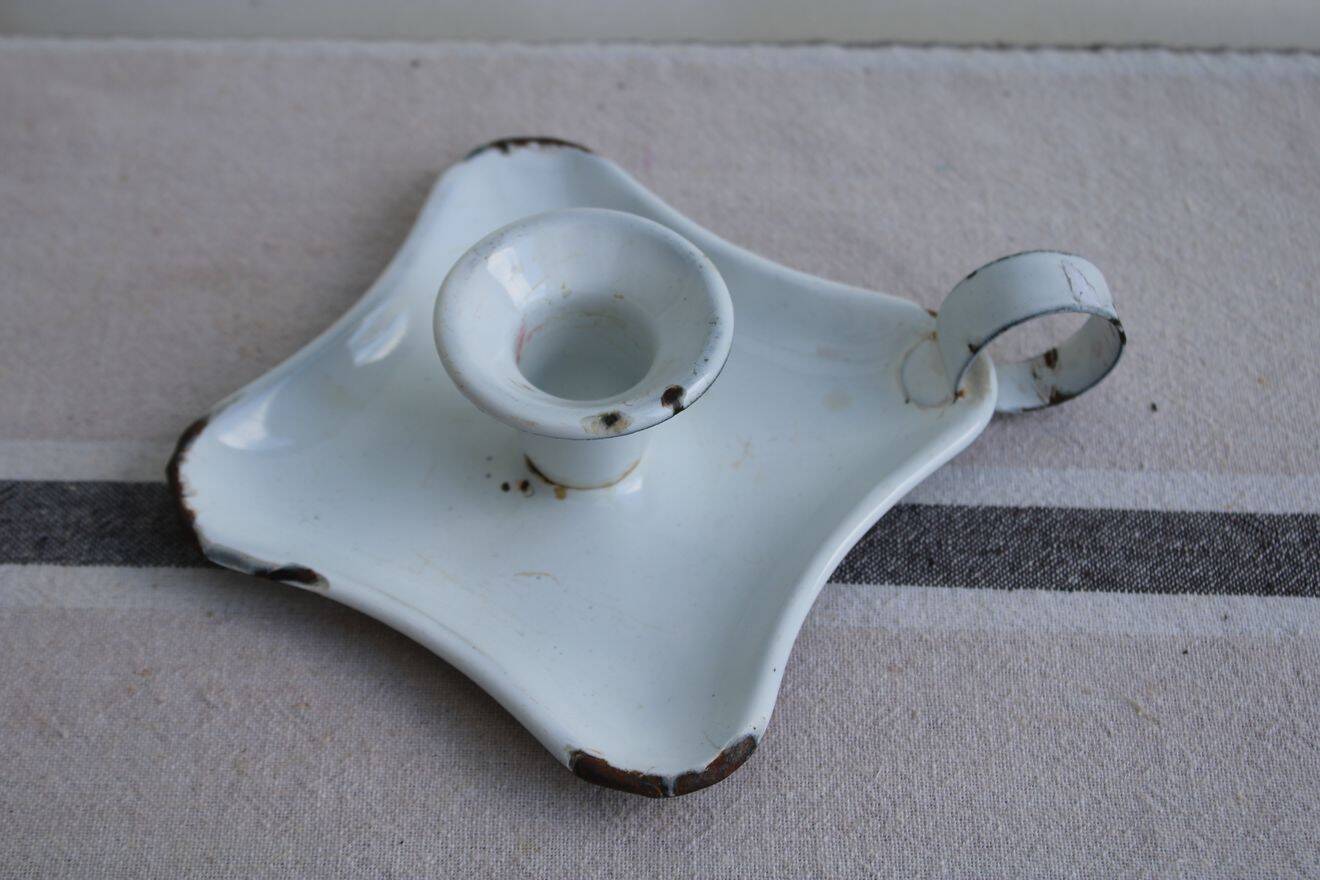 Antique enamel candle holder