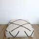 Black and white Berber ottoman cover with diamonds