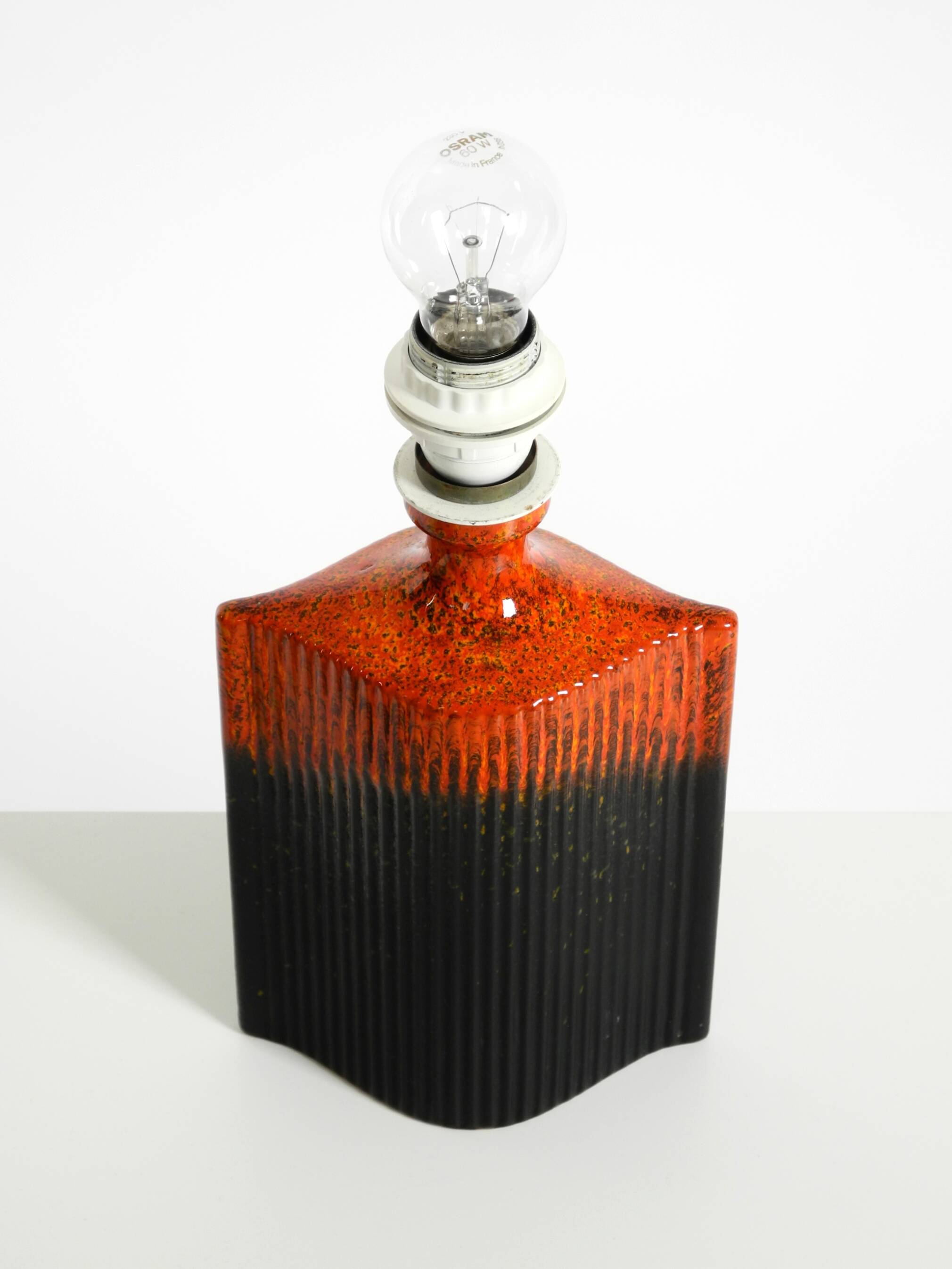 Unique 1960s ceramic table lamp in red and black by Kaiser Leuchten