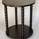 Set of side table and 2 stools, stained black wood, Circa 1950.