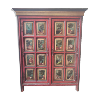 Two-door cabinet consisting of 24 different hand-painted panels