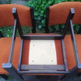 Series of 6 vintage chairs in orange fabric and black lace-up.