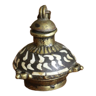 Old brass flask and shells