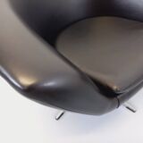 Pair of vintage Scandinavian swivel armchairs in faux leather and chrome.