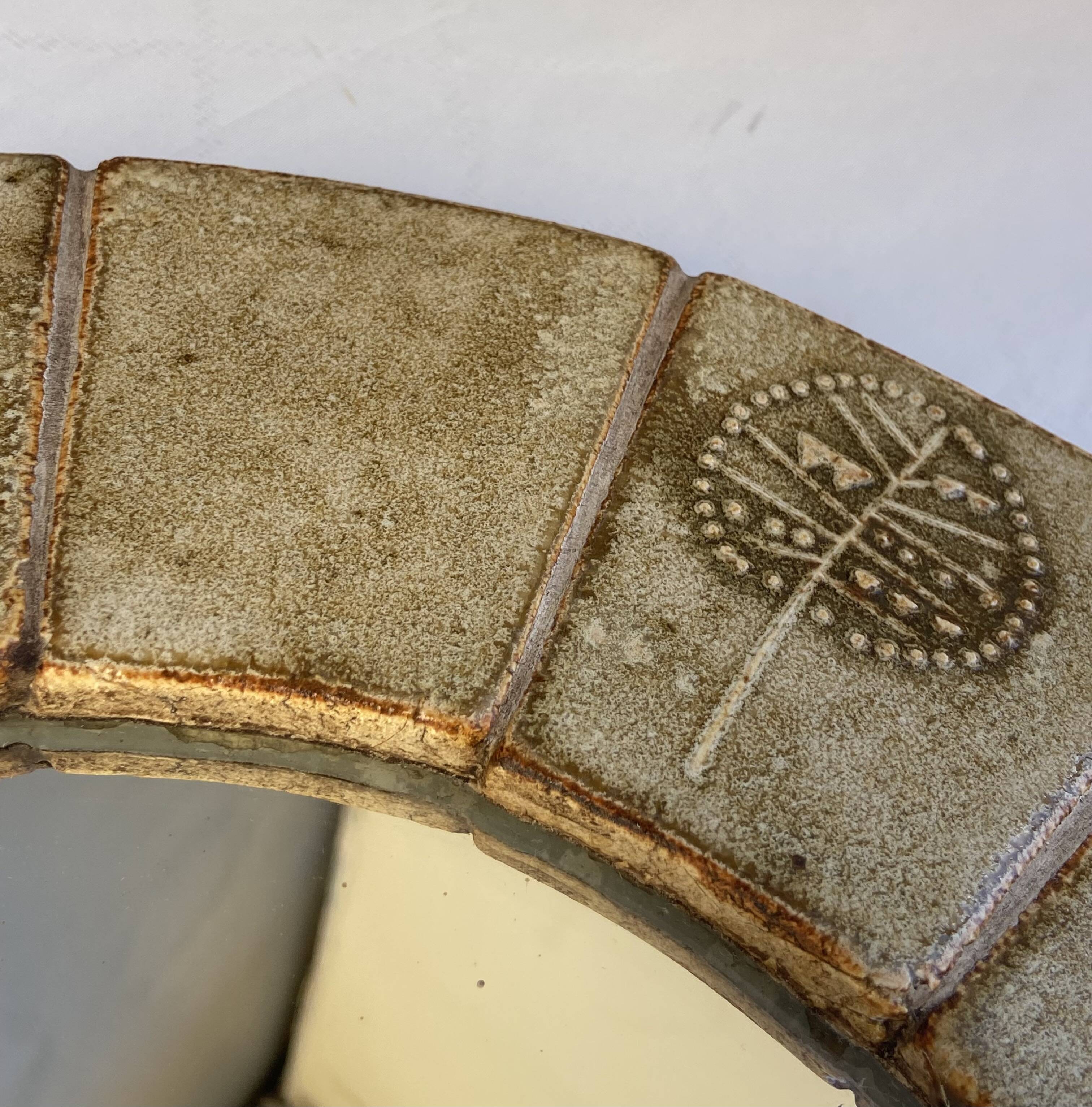 Ceramic mirror by Raymonde Leduc from the 1960s.