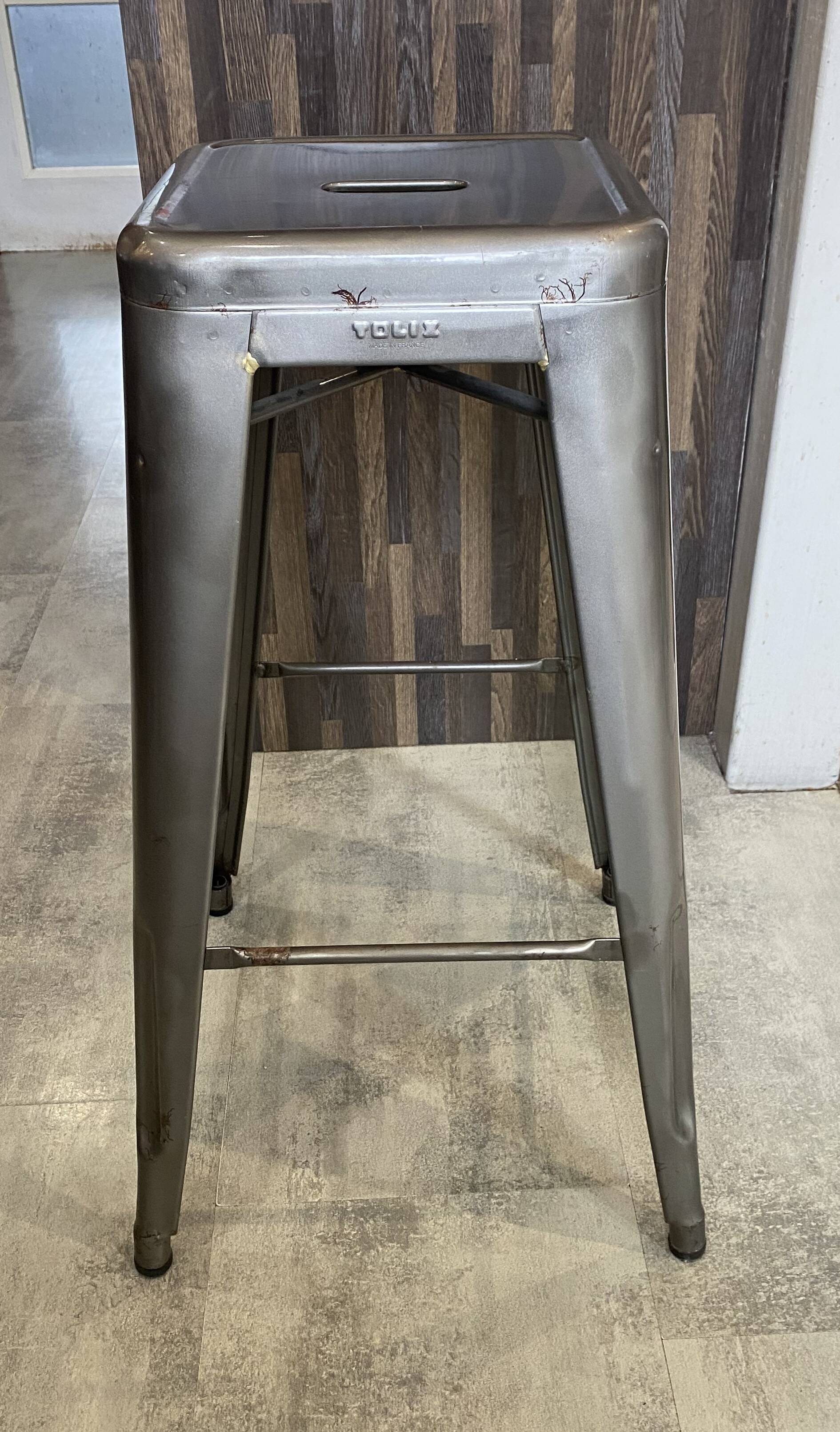 Genuine TOLIX H75 industrial high bar stool, stackable, varnished metal.
