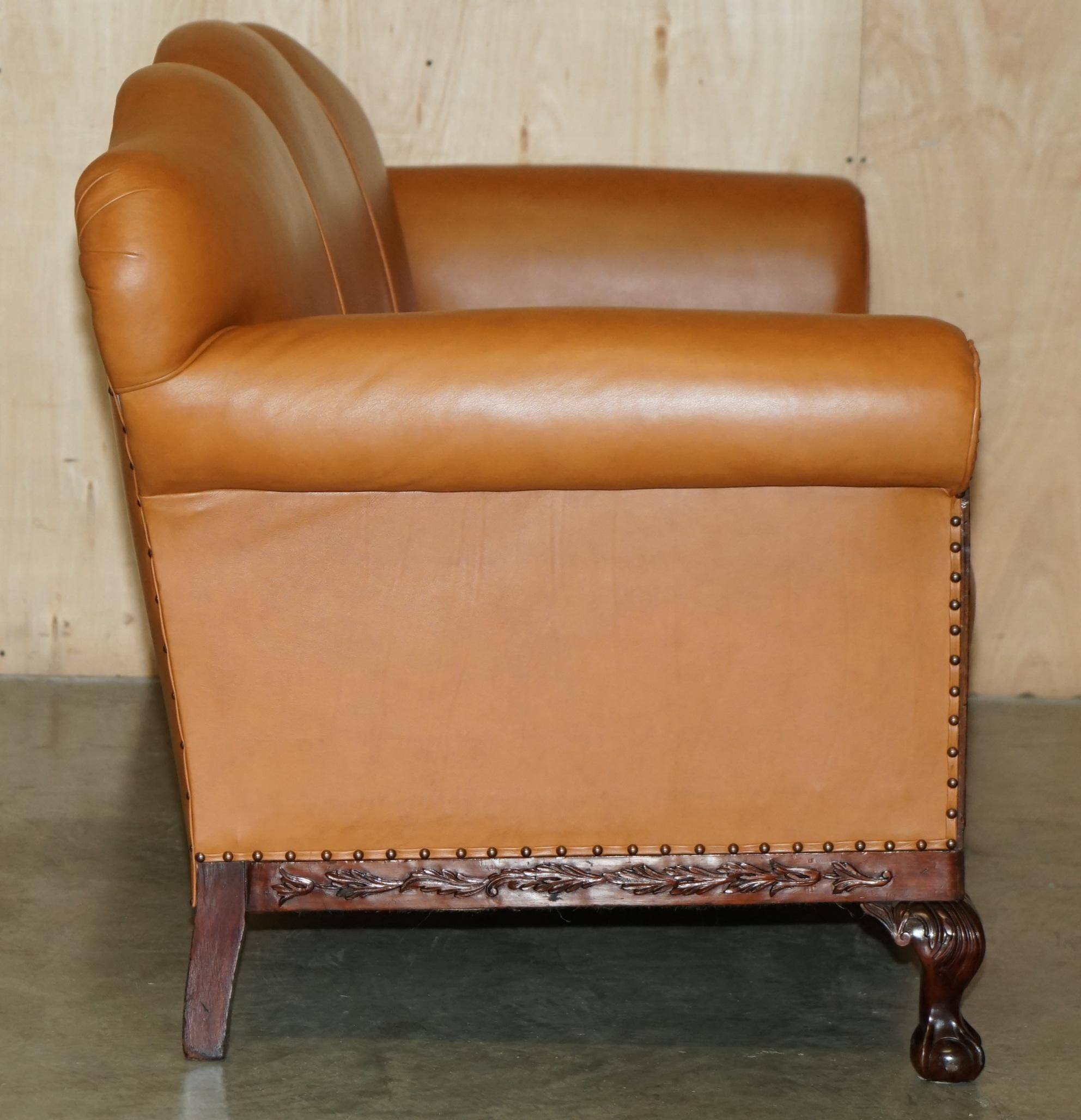 Restored three-seater leather canapé in late Victorian style.