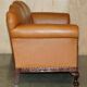 Restored three-seater leather canapé in late Victorian style.