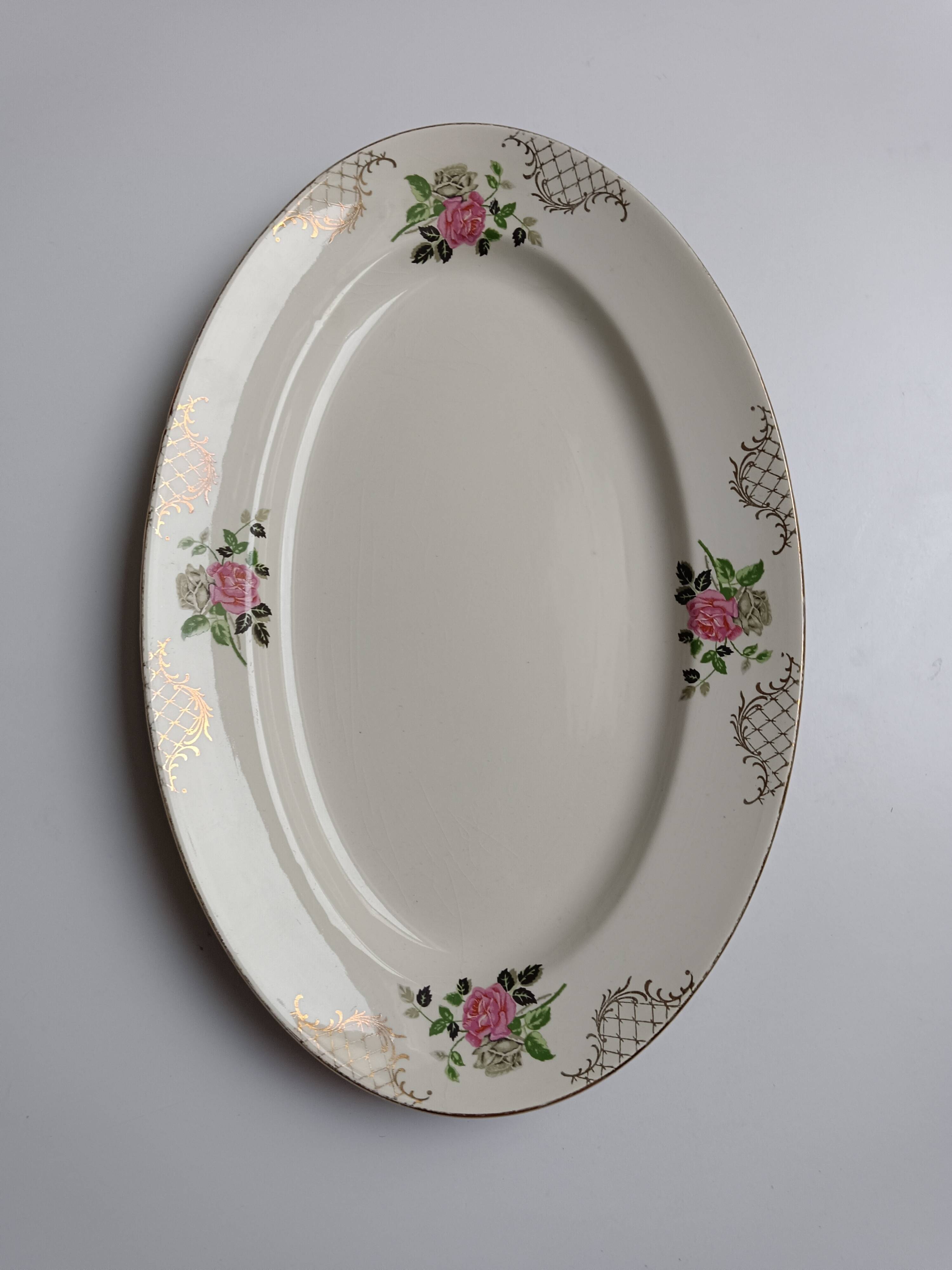 Oval plate Sarreguemines cream with pink gilding, antique.