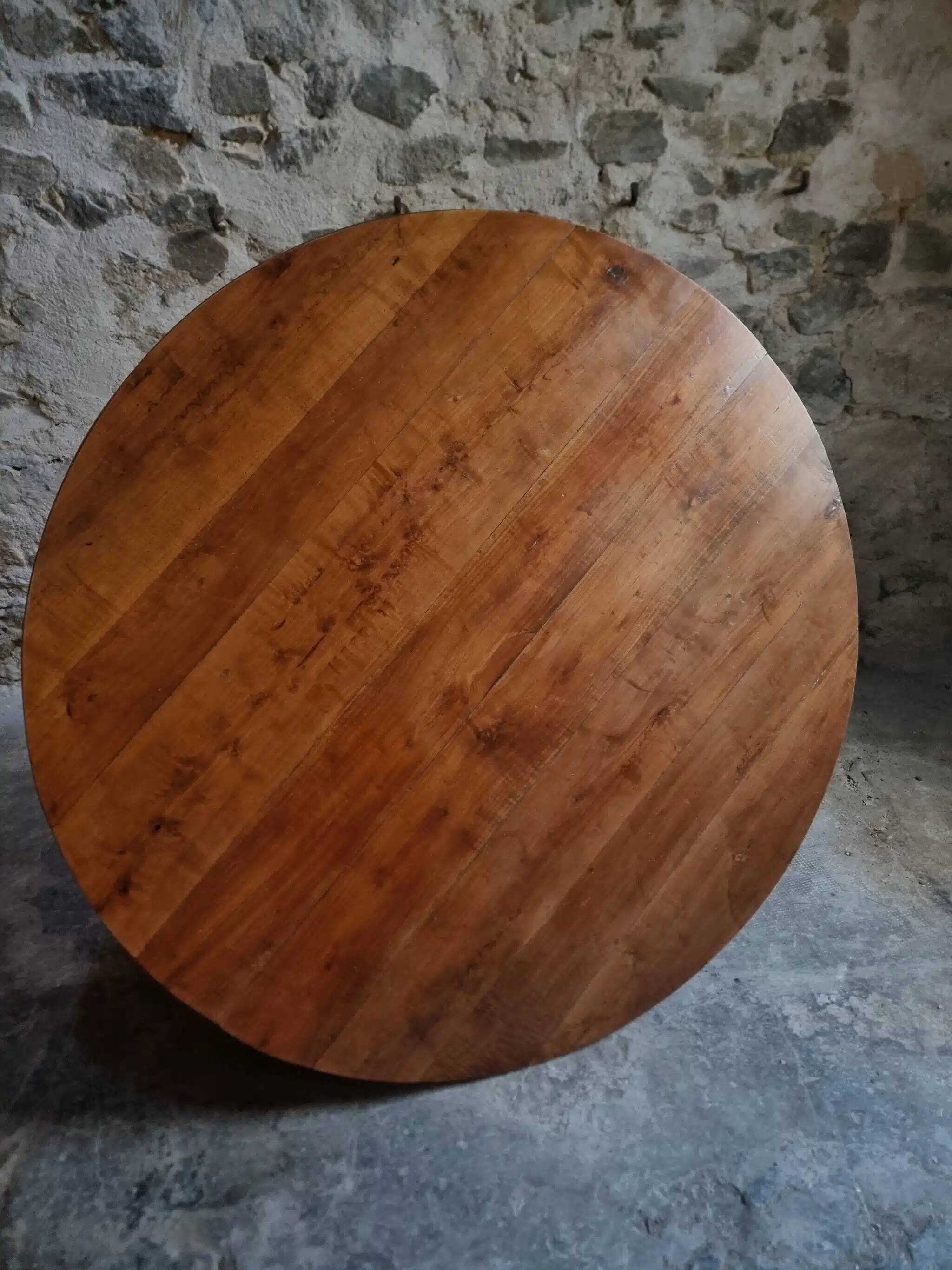 Antique round dining table in cherry wood, France, circa 1920.