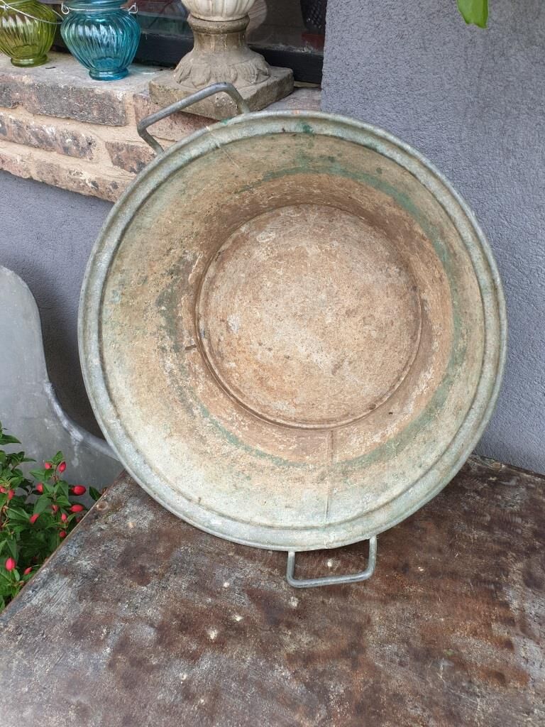 Old zinc basin with handles