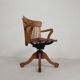 Oak office chair with adjustable spring system and height adjustment, 1950s.