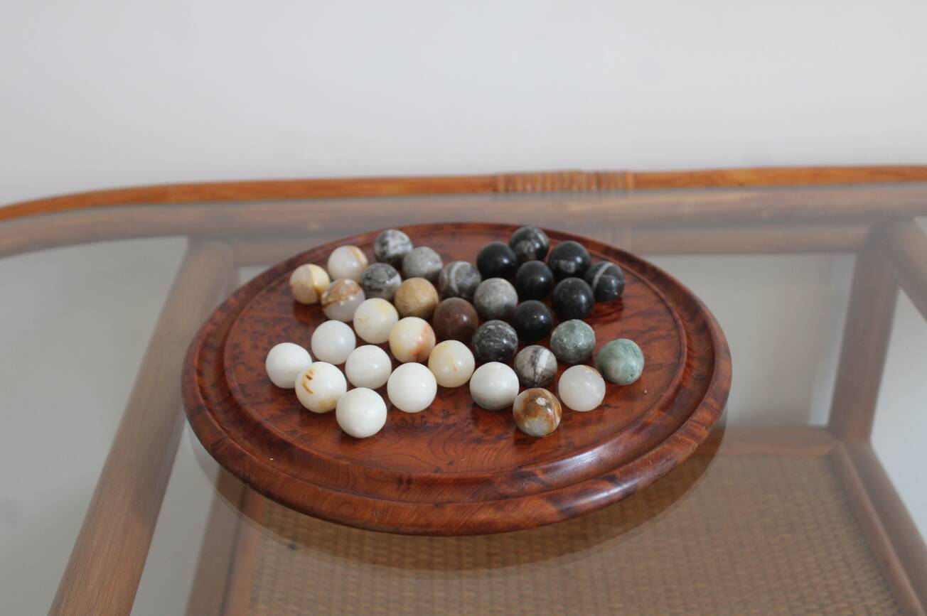 Solitaire game or mineral abacus