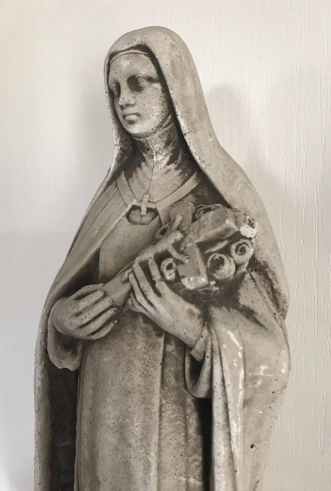 Religious statue of sainte therese of lisieux “the little flower of jesus” in stone