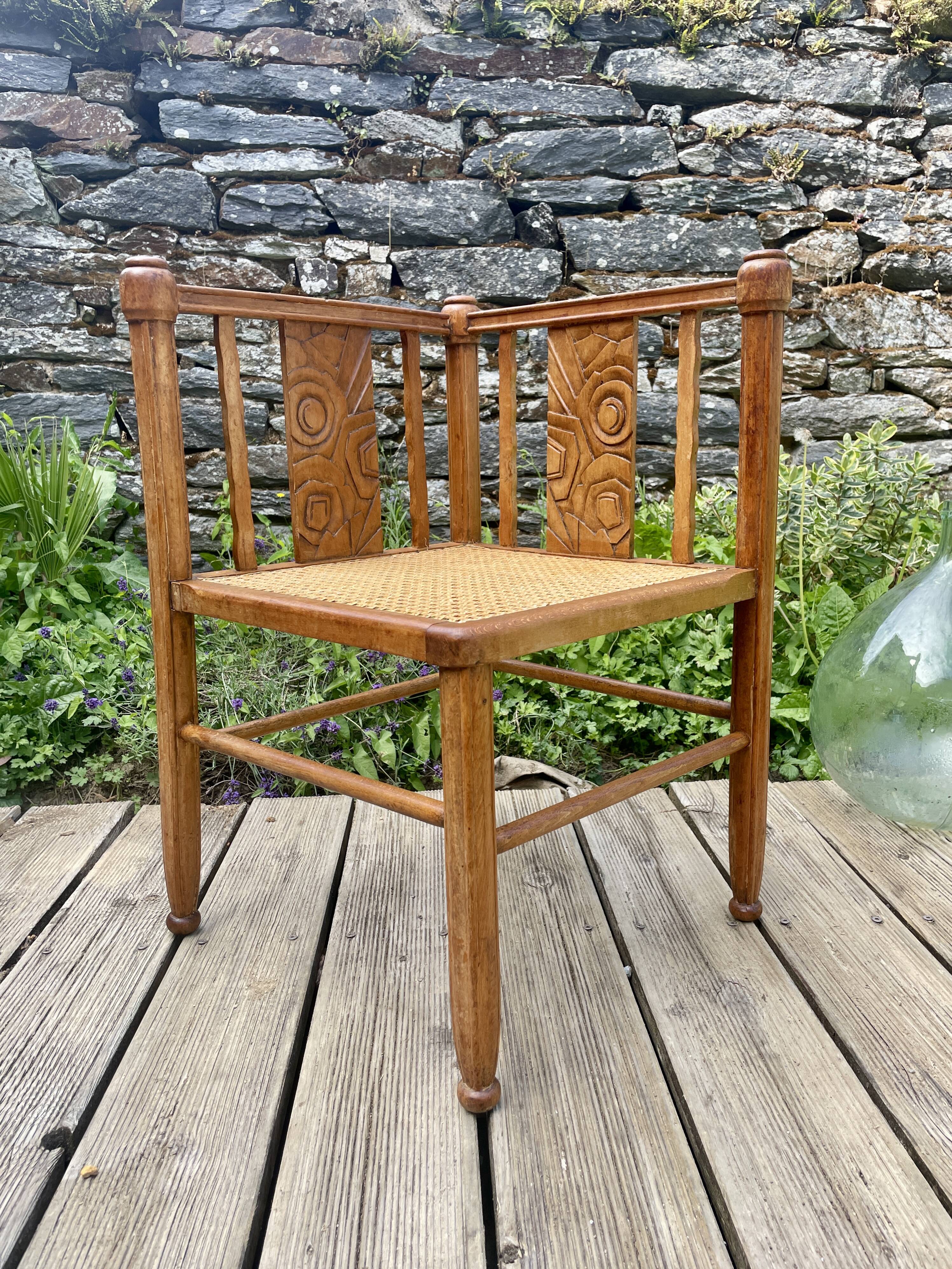 Art Deco corner chair with caning