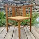 Art Deco corner chair with caning