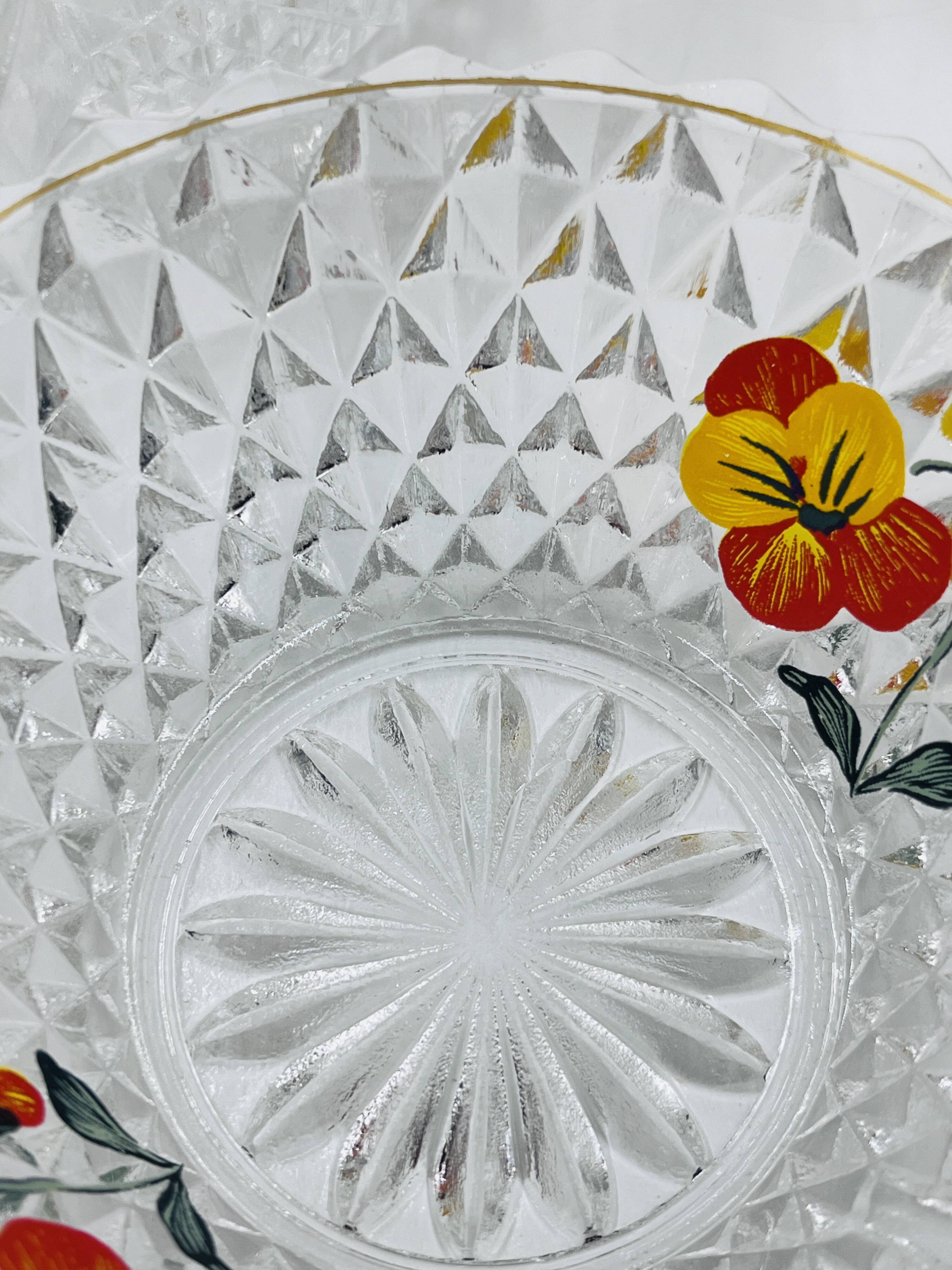 Vintage glass fruit salad serving set with a pansy design.