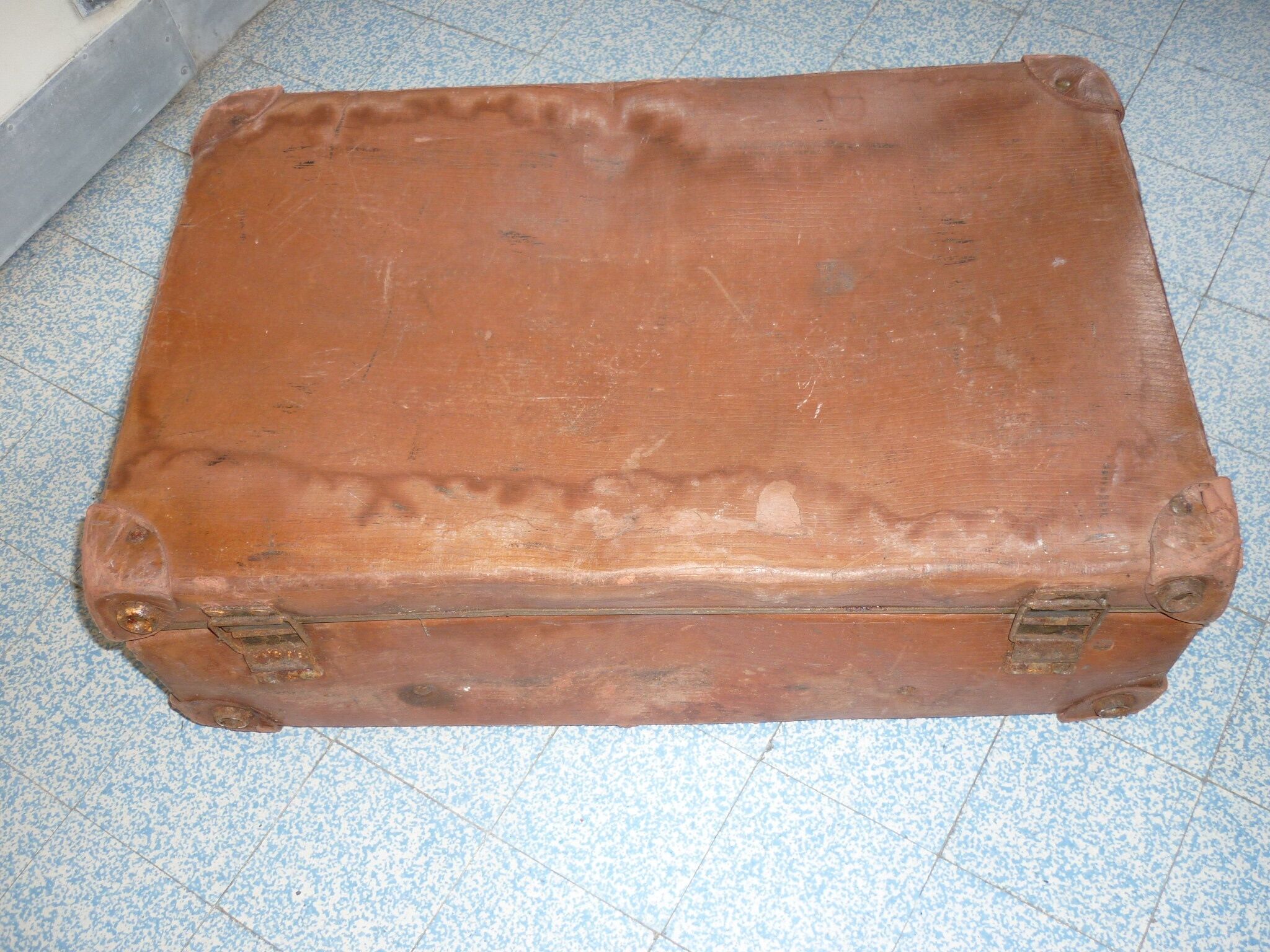 Unica red-haired suitcase