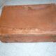 Unica red-haired suitcase