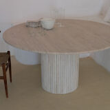 Omega circular dining table in natural travertine