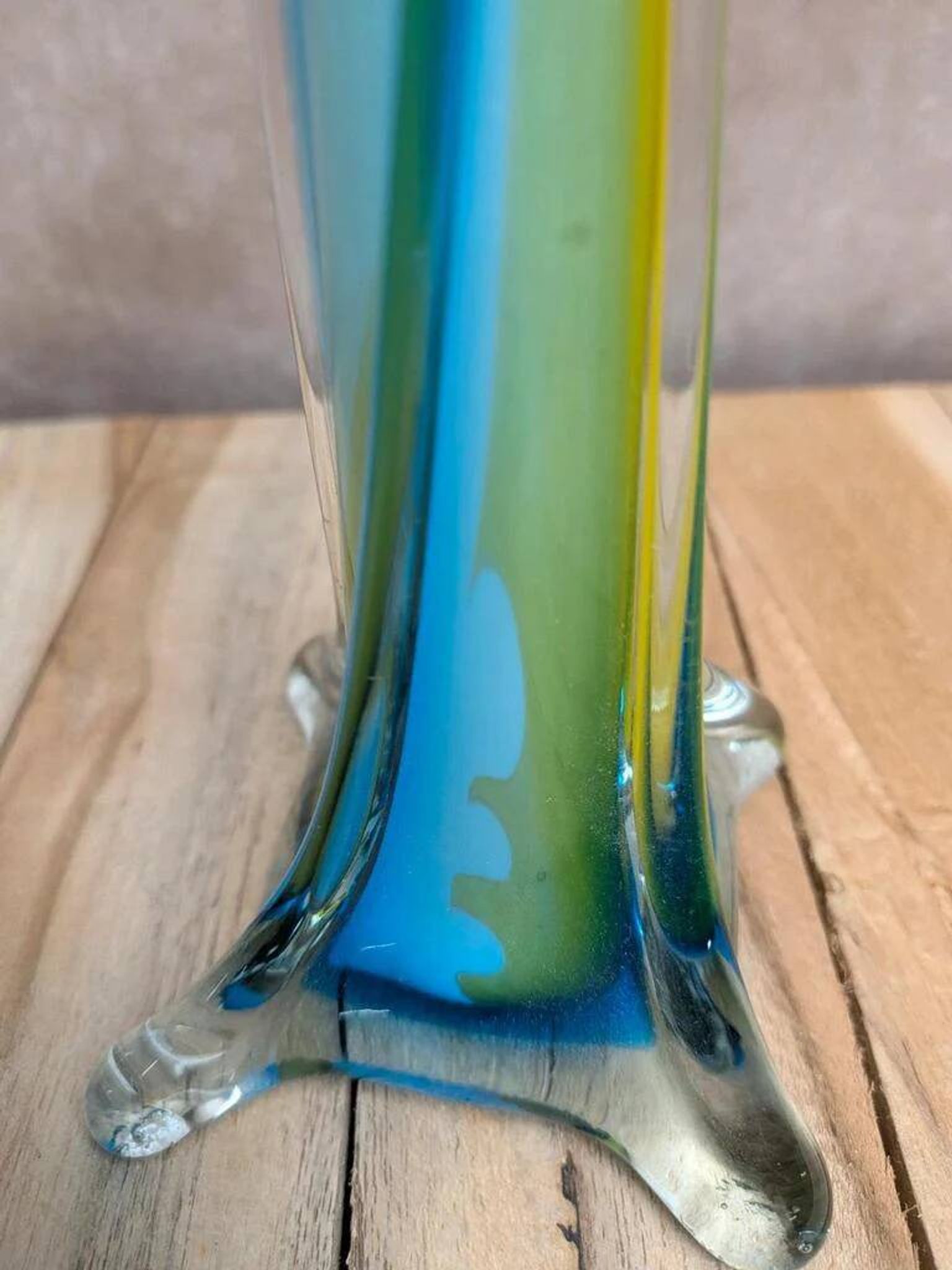 Vintage glass vase in blue and yellow Murano style.