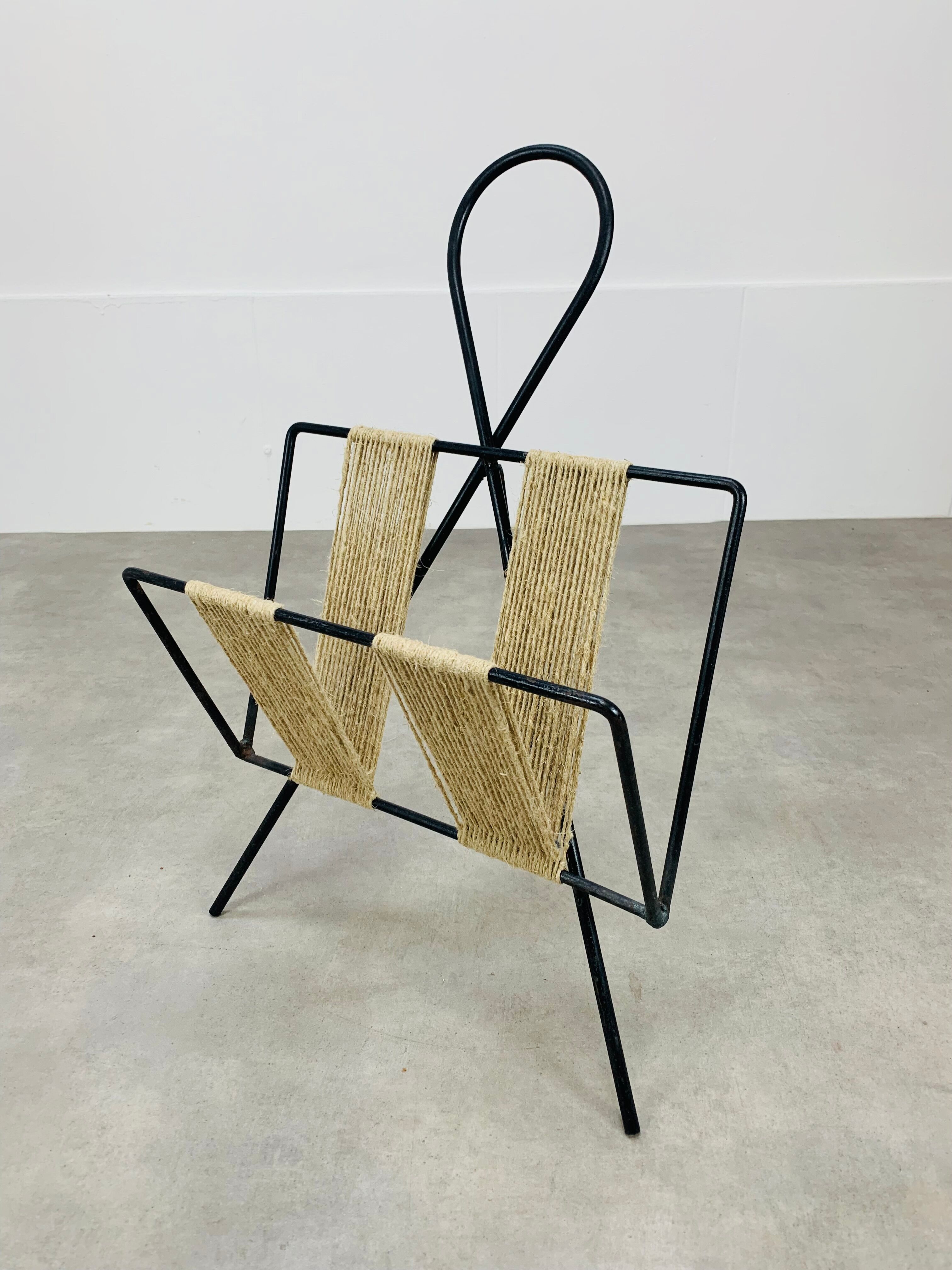 Tripod metal and rope magazine door 50s