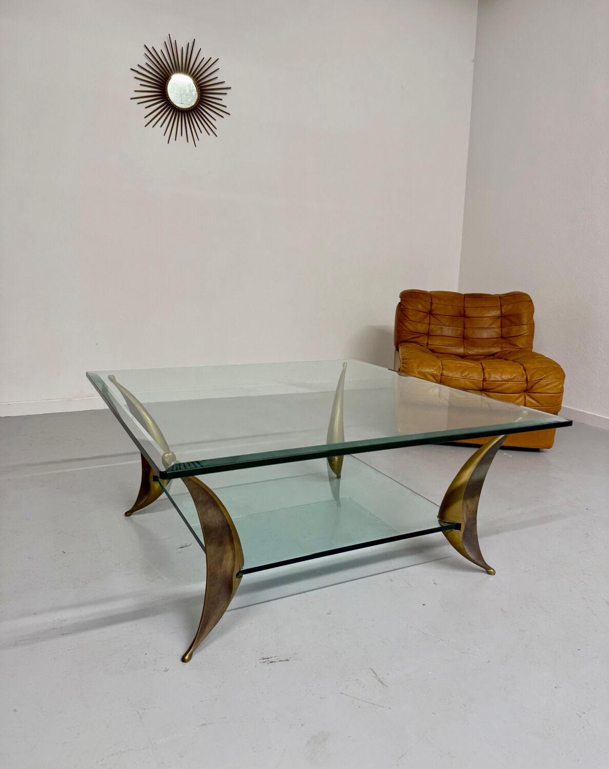 Glass coffee table with solid brass legs, Italian design from the 60s
