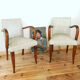 Pair of vintage armchairs in wood and imitation leather