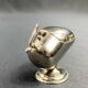 Individual ashtray with metal clasp