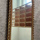 Ancien miroir en bois doré et verre biseauté