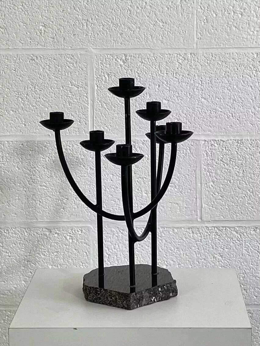 Metal candle holder and black quartz base