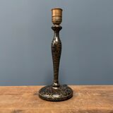 Black table lamp with paint splatters from the 1920s