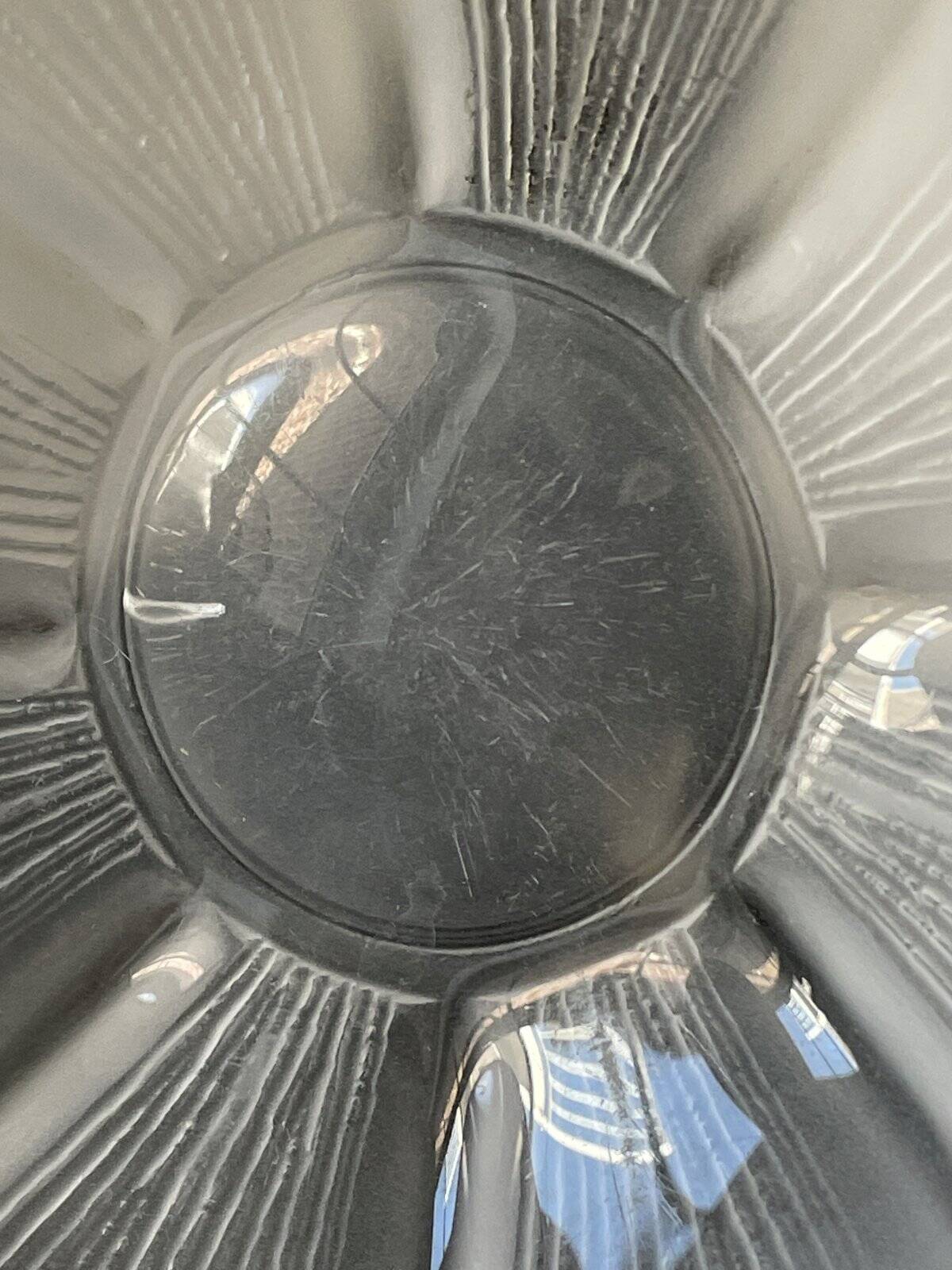 Thick transparent and opalescent glass cup