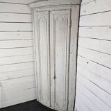 19th century curved corner cupboard in patinated oak