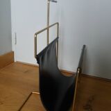 Modernist magazine rack in the style of Jacques Adnet