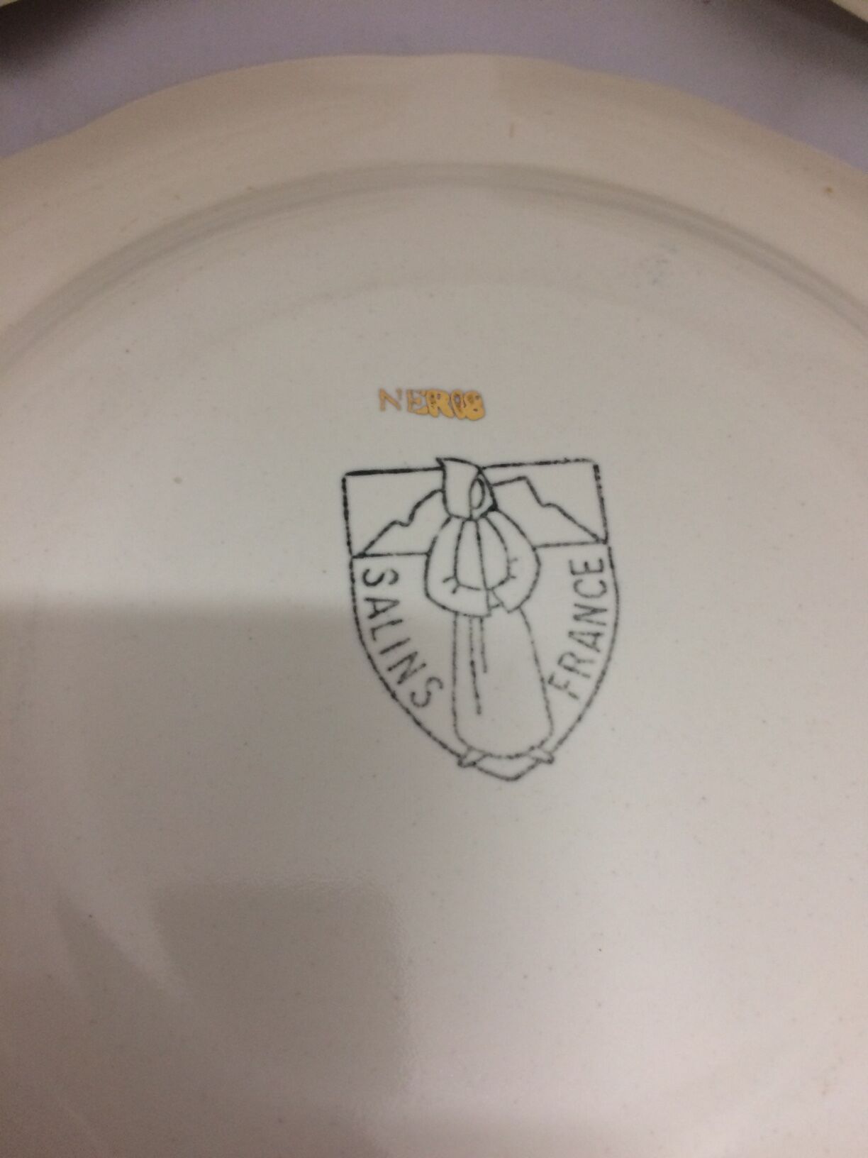 Old dessert plates in salins France earthenware