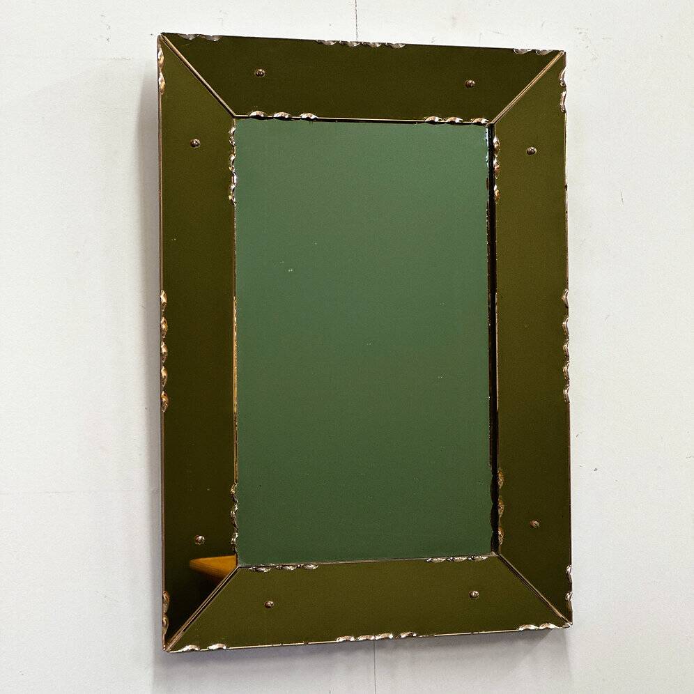 Striking French amber-coloured mirror with sculpted edge details, 1940s